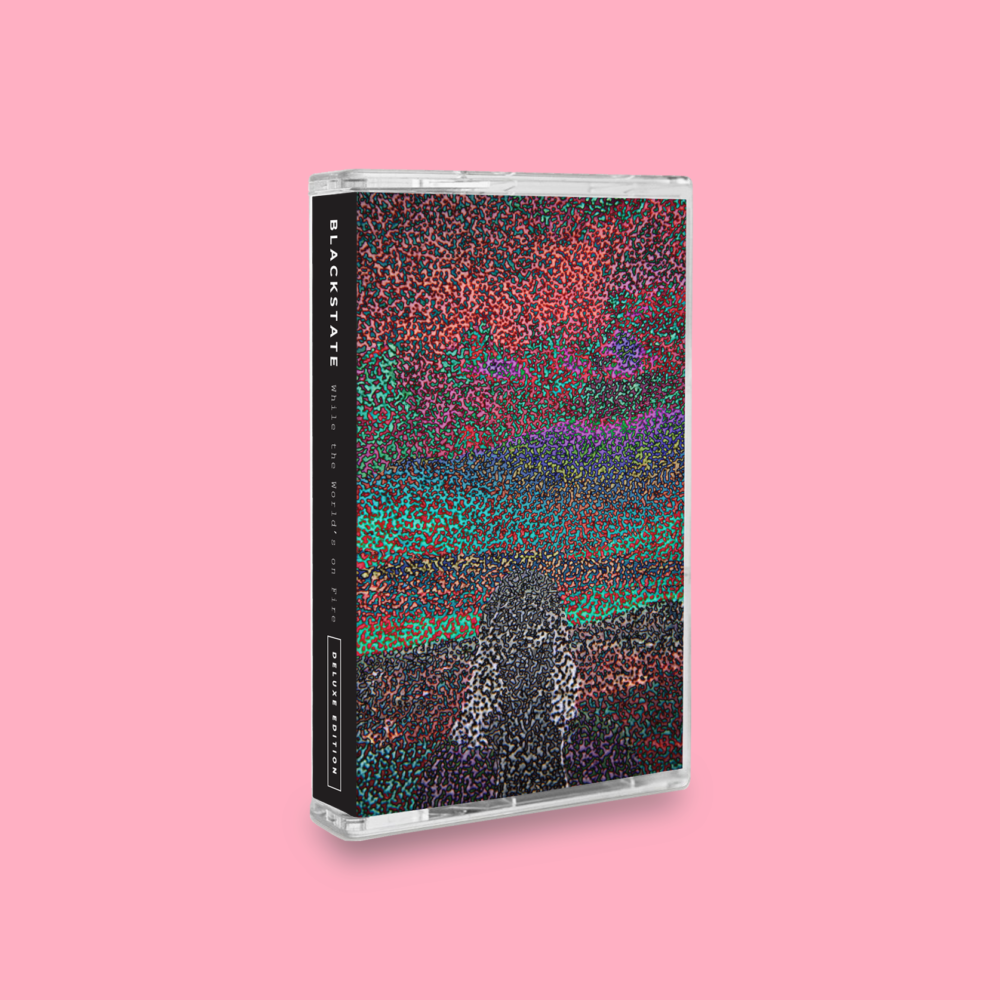 While the World’s on Fire (Deluxe Edition – Cassette)